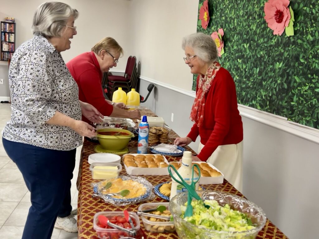 Residents choosing fresh meals.